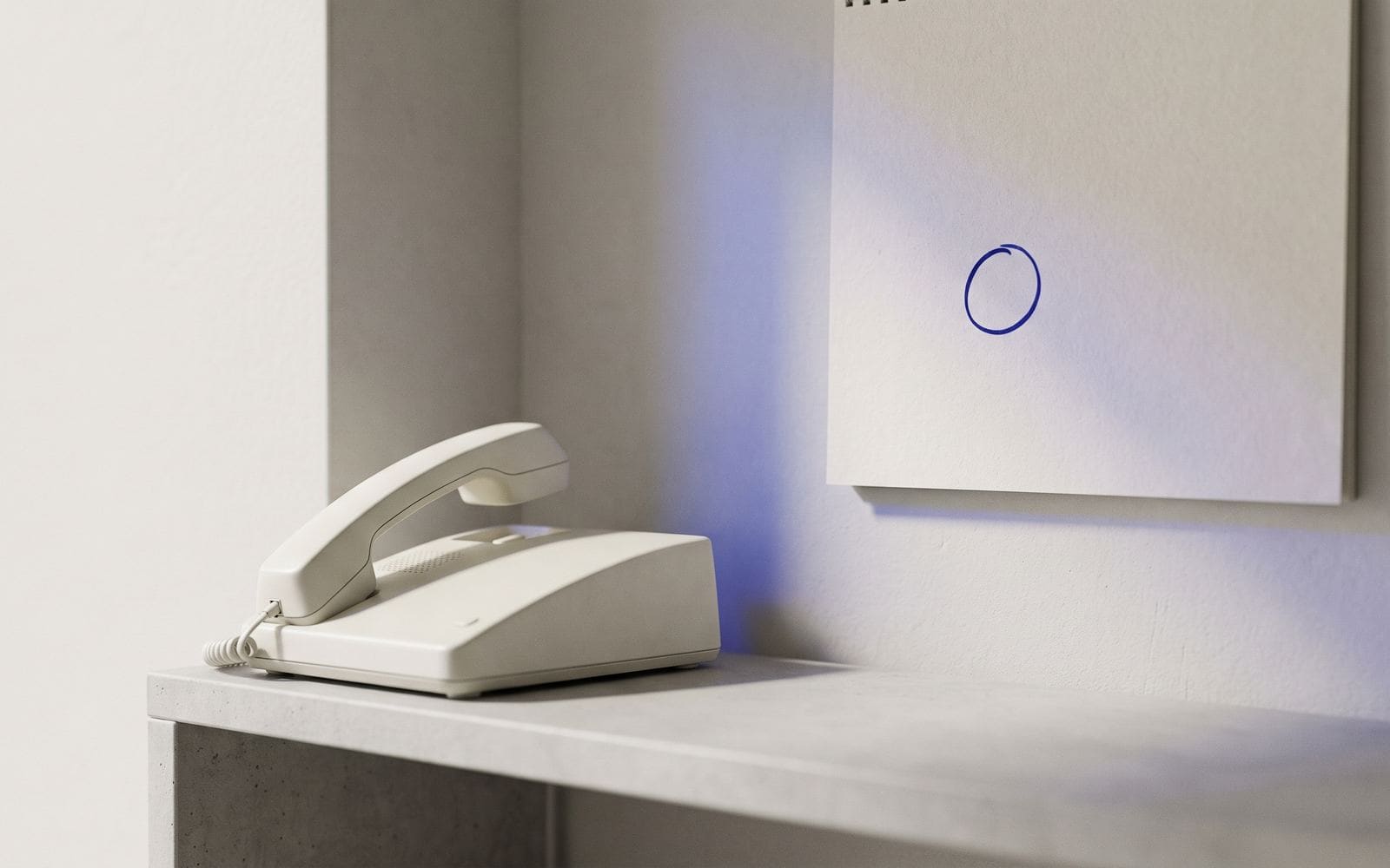 A desk phone handset lifted off its cradle beside a wall calendar with one day circled